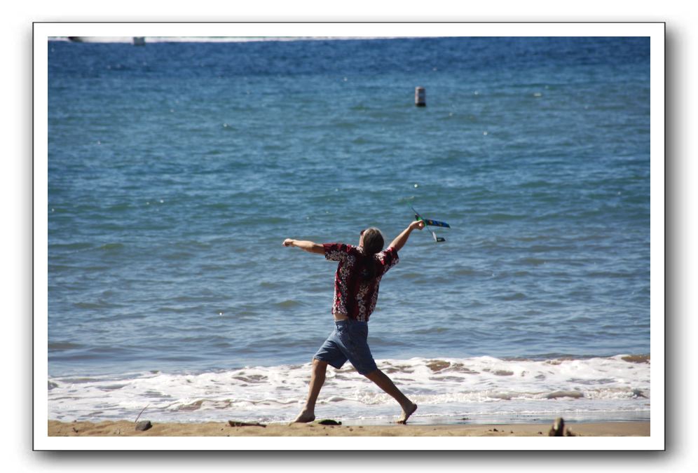 Gliders, Sand, and Surfers in Maui - 083